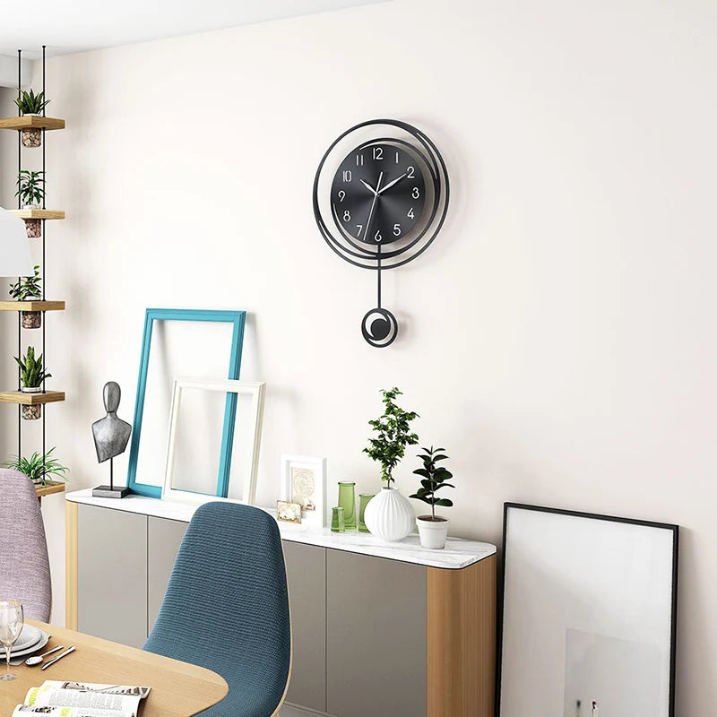 Circular hollow swinging wall clock